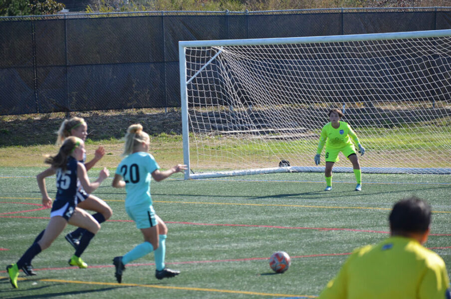 Evelyn Dickerson guarding the goal.